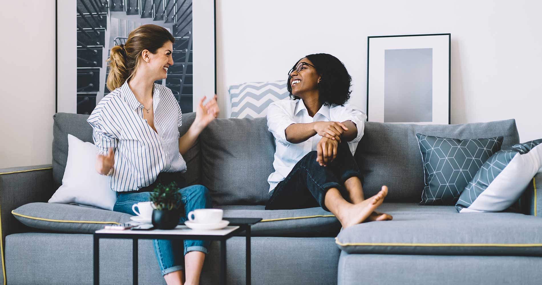 Happy women chatting over a coffee