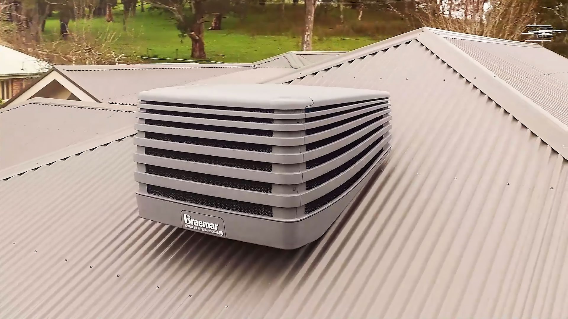 Braemar Evolution evaporative cooler on house roof