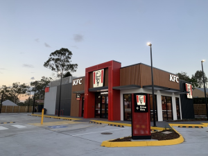 KFC restaurant exterior featuring a commercial HVAC installation